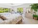 This room features a bright airy feel with tree top views from the windows at 920 E Lake Dr, Tarpon Springs, FL 34688