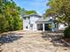 Unique home featuring a large garage with ample parking at 920 E Lake Dr, Tarpon Springs, FL 34688