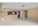Spacious open floor plan living area with tile flooring at 9287 Horizon Dr, Spring Hill, FL 34608