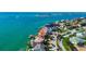 Breathtaking aerial view of the waterfront home showcasing its location on the open bay at 940 Monte Cristo Blvd, Tierra Verde, FL 33715