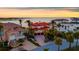 An aerial view of the property, highlighting its desirable waterfront location and stunning architecture at 940 Monte Cristo Blvd, Tierra Verde, FL 33715