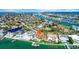 Aerial view of a waterfront community and waterway at 940 Monte Cristo Blvd, Tierra Verde, FL 33715