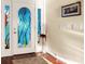 Bright foyer features a stained-glass door with vibrant underwater scenes and elegant decor at 940 Monte Cristo Blvd, Tierra Verde, FL 33715