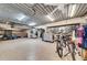Spacious garage with epoxy floor, ample storage, and organized layout for functionality at 940 Monte Cristo Blvd, Tierra Verde, FL 33715