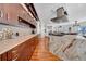 Kitchen featuring granite countertops and designer backsplash at 940 Monte Cristo Blvd, Tierra Verde, FL 33715