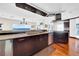 Gourmet kitchen featuring granite countertops, stainless steel appliances, and water views at 940 Monte Cristo Blvd, Tierra Verde, FL 33715