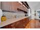 Gourmet kitchen with custom cabinetry and stylish countertops at 940 Monte Cristo Blvd, Tierra Verde, FL 33715