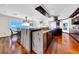Spacious kitchen with island and view of the waterfront at 940 Monte Cristo Blvd, Tierra Verde, FL 33715