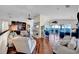Bright living room with hardwood floors, fireplace, water views and comfortable seating at 940 Monte Cristo Blvd, Tierra Verde, FL 33715