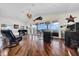 Spacious living room with grand piano and stunning water views at 940 Monte Cristo Blvd, Tierra Verde, FL 33715