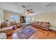 Spacious home office with built-in desk, comfortable seating, and water views at 940 Monte Cristo Blvd, Tierra Verde, FL 33715