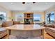 Home office offers ocean views, custom built-ins, hardwood floors and comfortable seating at 940 Monte Cristo Blvd, Tierra Verde, FL 33715