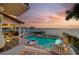 Inviting backyard pool and spa with waterfront views, perfect for luxurious outdoor living at 940 Monte Cristo Blvd, Tierra Verde, FL 33715