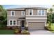 Charming two-story home with neutral tones, manicured landscaping and attached two car garage at 10829 Patoka Ter, Parrish, FL 34219