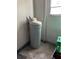 Utility area with water filtration system and access door at 12092 97Th Ave, Seminole, FL 33772