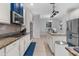 Open concept kitchen, featuring stainless steel appliances and center island at 13424 Hunters Point St, Spring Hill, FL 34609
