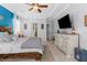 Bright main bedroom featuring decor and a large window at 13424 Hunters Point St, Spring Hill, FL 34609