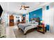 Spacious main bedroom featuring natural light and a ceiling fan at 13424 Hunters Point St, Spring Hill, FL 34609