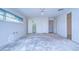 Large bedroom with a walk-in closet and standard closet at 13908 Paradise Ln, Dade City, FL 33525