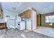 Bright kitchen featuring white appliances and lots of natural light at 13908 Paradise Ln, Dade City, FL 33525