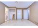 Living space offers a blank canvas with easy access to storage room, ready for new vision at 13908 Paradise Ln, Dade City, FL 33525