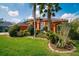 Well-maintained front yard and mature landscaping at 17104 Tiffany Lake Pl, Lutz, FL 33549