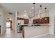 Updated kitchen featuring stainless steel appliances, ample cabinet space, and counter seating at 17104 Tiffany Lake Pl, Lutz, FL 33549