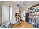 Bedroom featuring hardwood floors and storage at 2419 Mallory Ave, Tampa, FL 33605