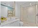 Modern bathroom featuring a glass-enclosed shower, sleek white vanity, and stylish fixtures for a spa-like feel at 301 1St Street S # 1901, St Petersburg, FL 33701