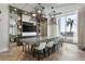 Bright conference room with modern lighting, large table, and city views at 301 1St Street S # 1901, St Petersburg, FL 33701