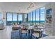 Modern dining room with scenic water views, stylish lighting, and an adjacent living area perfect for entertaining at 301 1St Street S # 1901, St Petersburg, FL 33701