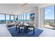 Elegant dining area with panoramic ocean views, sophisticated decor, and seamless integration with the living space at 301 1St Street S # 1901, St Petersburg, FL 33701