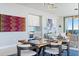 Dining room boasting stylish decor, a modern dining table, and seamless flow into the kitchen and living spaces at 301 1St Street S # 1901, St Petersburg, FL 33701