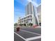 Modern high-rise building with balconies offering city views and street-level access at 301 1St Street S # 1901, St Petersburg, FL 33701