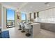 Modern kitchen featuring an island with seating, and a full suite of stainless steel appliances and stunning waterfront views at 301 1St Street S # 1901, St Petersburg, FL 33701