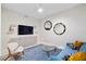 Chic living room boasting stylish decor, a comfortable blue couch, and modern furniture for a relaxing space at 301 1St Street S # 1901, St Petersburg, FL 33701