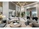 Bright and airy lobby featuring comfortable seating areas, modern artwork, and large windows, perfect for welcoming residents and guests at 301 1St Street S # 1901, St Petersburg, FL 33701
