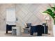 Elegant lobby area with decorative wall paneling, seating, and indoor plants at 301 1St Street S # 1901, St Petersburg, FL 33701