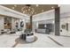 A stylish building lobby features marble floors, designer lighting, a reception desk and modern decor throughout the common area at 301 1St Street S # 1901, St Petersburg, FL 33701