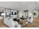 Stylish lounge featuring comfortable seating, a large TV, and contemporary decor at 301 1St Street S # 1901, St Petersburg, FL 33701