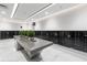 Clean and organized mail room with a long table and multiple mailboxes at 301 1St Street S # 1901, St Petersburg, FL 33701