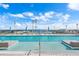 Resort-style pool and sundeck with skyline views offering the perfect space for relaxation and entertainment with lounge seating at 301 1St Street S # 1901, St Petersburg, FL 33701