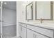 Bathroom with dual sinks and large mirrors at 31430 Hayman Loop, Wesley Chapel, FL 33545