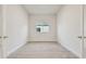 Bright bedroom featuring plank flooring and neutral walls at 31430 Hayman Loop, Wesley Chapel, FL 33545