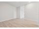 Empty bedroom with light wood-look floors at 31430 Hayman Loop, Wesley Chapel, FL 33545