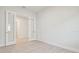 Bedroom featuring plank flooring and glass pane doors at 31430 Hayman Loop, Wesley Chapel, FL 33545
