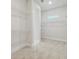 Walk-in closet with shelving and carpeted floors at 31430 Hayman Loop, Wesley Chapel, FL 33545