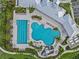 Aerial view of community amenities including a large pool with lap lanes, a freeform pool, and a splash pad with a slide at 3528 Golden Wheat Ln, Plant City, FL 33565
