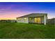 Beautiful backyard featuring a well-maintained lawn and screened-in porch at 3528 Golden Wheat Ln, Plant City, FL 33565