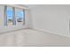 A spacious, light-filled bedroom with a large window and tile floors at 3528 Golden Wheat Ln, Plant City, FL 33565